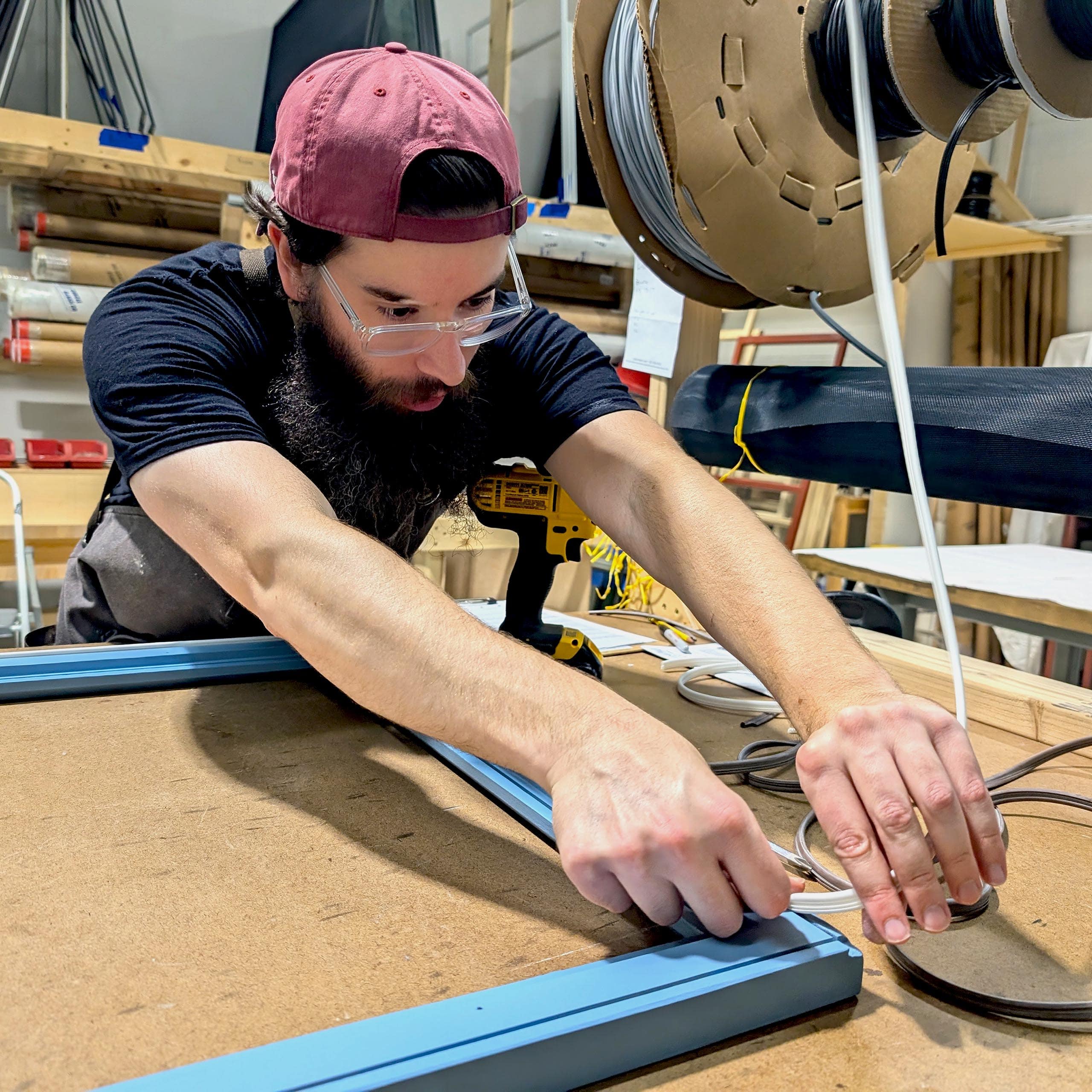 Man assembling furniture in a workshop