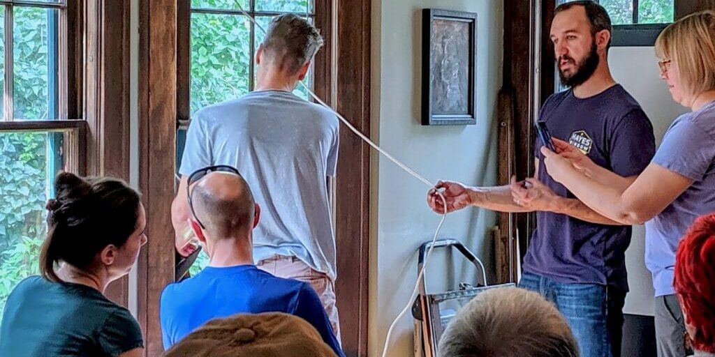 Group workshop discussing techniques indoors.